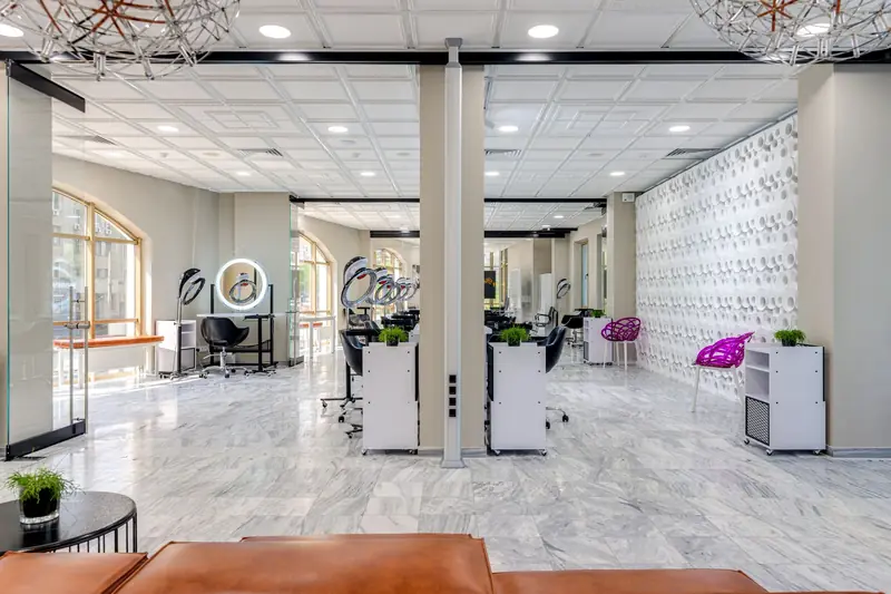 Bright beauty salon interior with marble floors